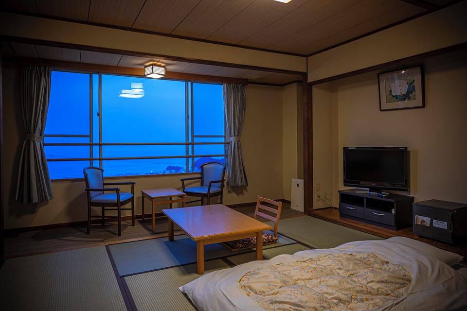 Japanese Room With Shared Washroom- Quadruple | In-room safe, free WiFi, bed sheets