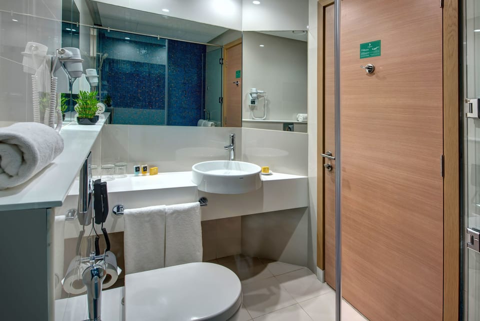 Shower, free toiletries, hair dryer, slippers