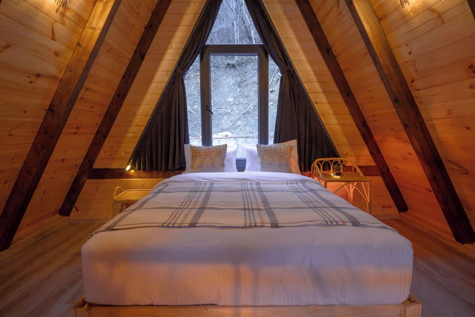 Design Tree House | Desk, laptop workspace, blackout drapes, free WiFi