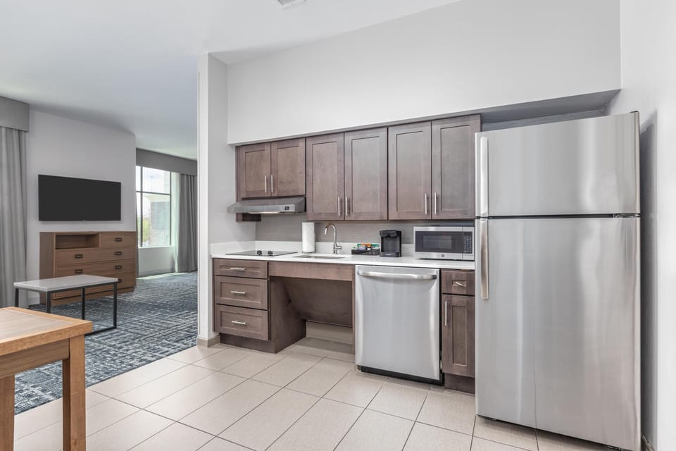 Studio, 1 King Bed, Accessible, Bathtub | Private kitchen | Full-size fridge, microwave, stovetop, dishwasher