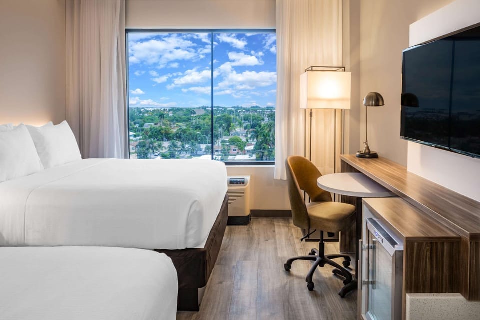 Premium bedding, down comforters, in-room safe, desk