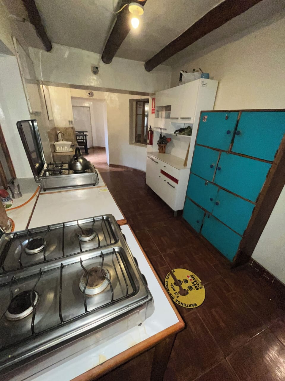 Coffee/tea maker, full-size fridge, shared microwave, oven