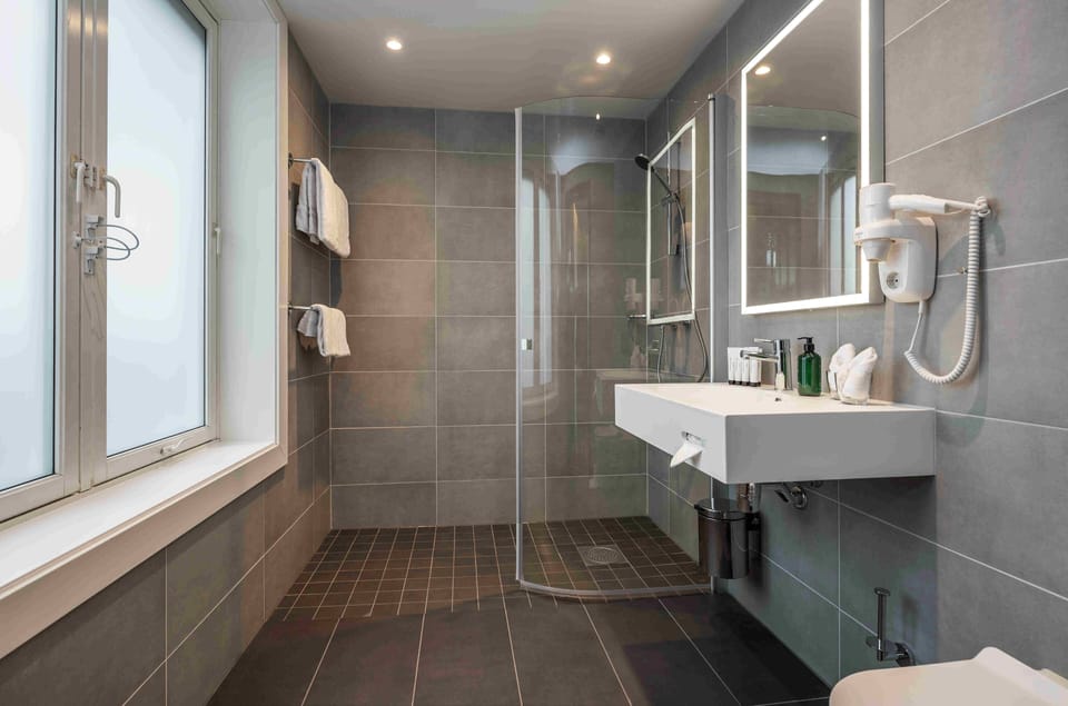 Superior Room, Non Smoking | Bathroom | Hair dryer, heated floors (bathroom), towels, soap