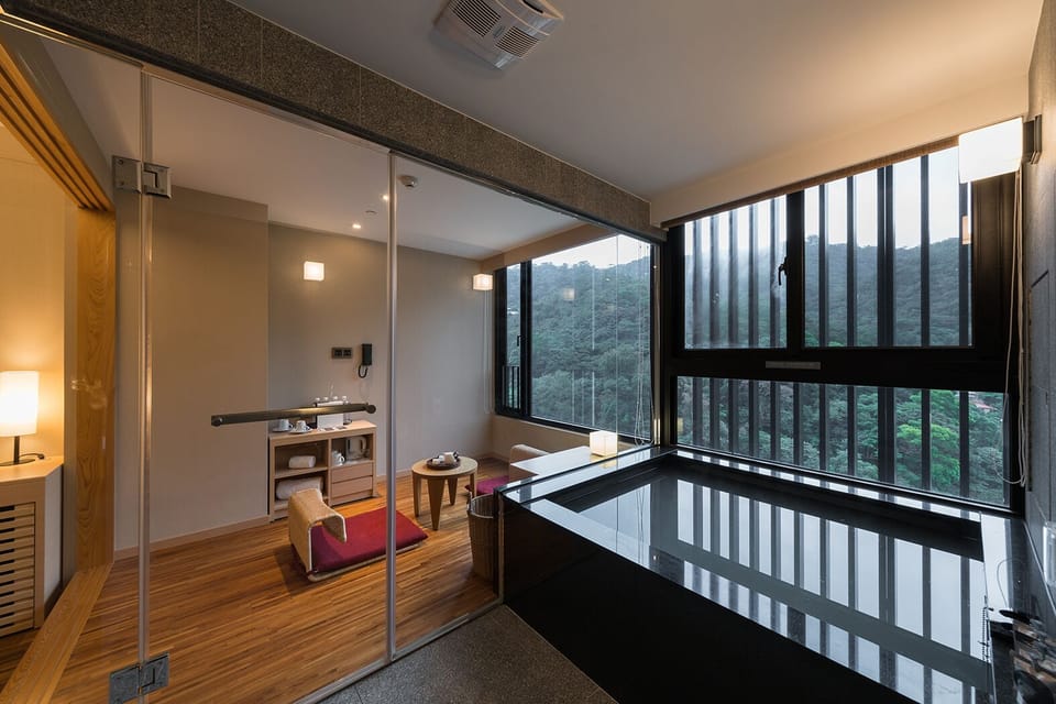 Deluxe Twin Room | Bathroom | Spring water tub, rainfall showerhead, hair dryer, bathrobes