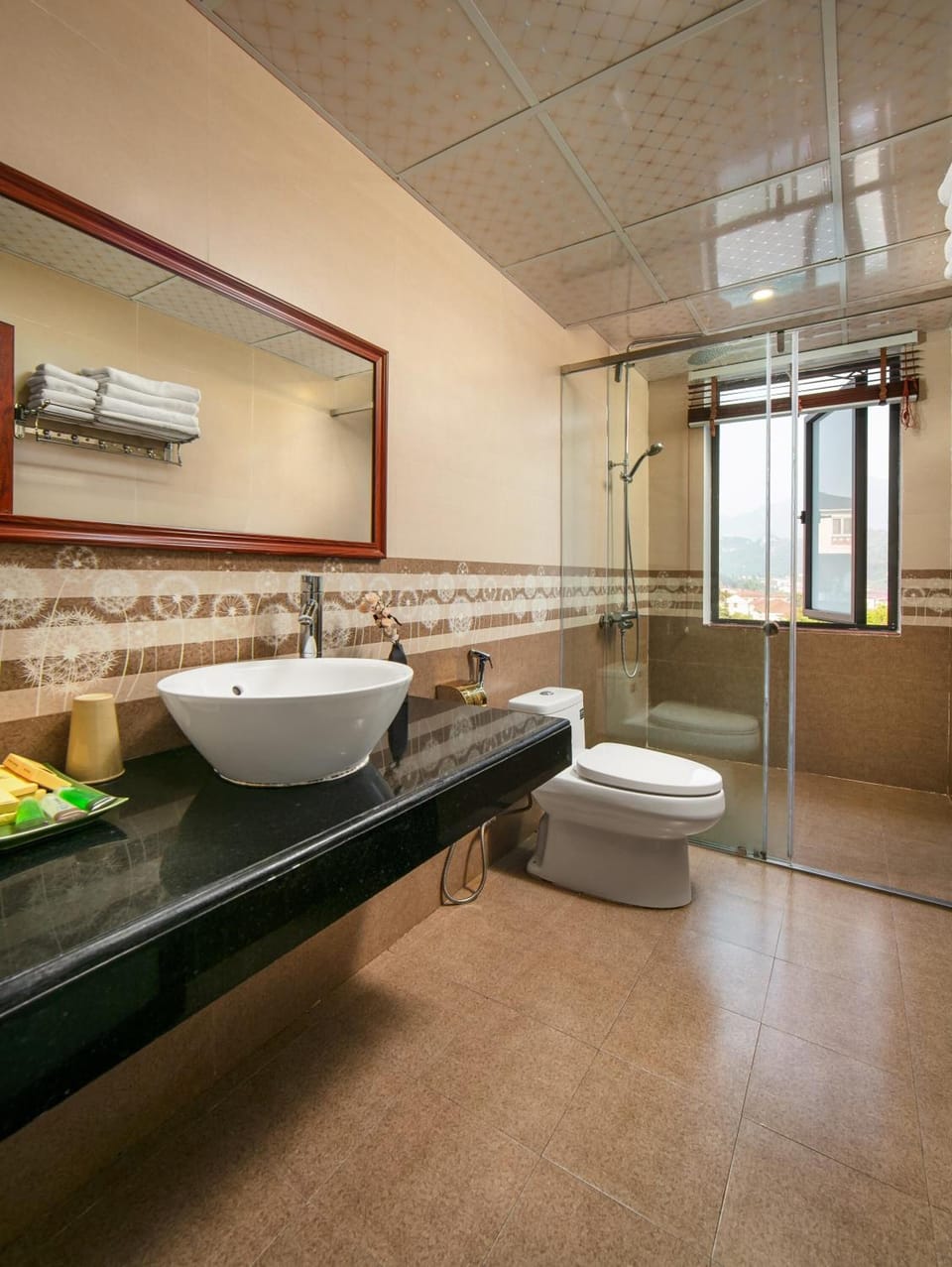 Shower, rainfall showerhead, designer toiletries, hair dryer