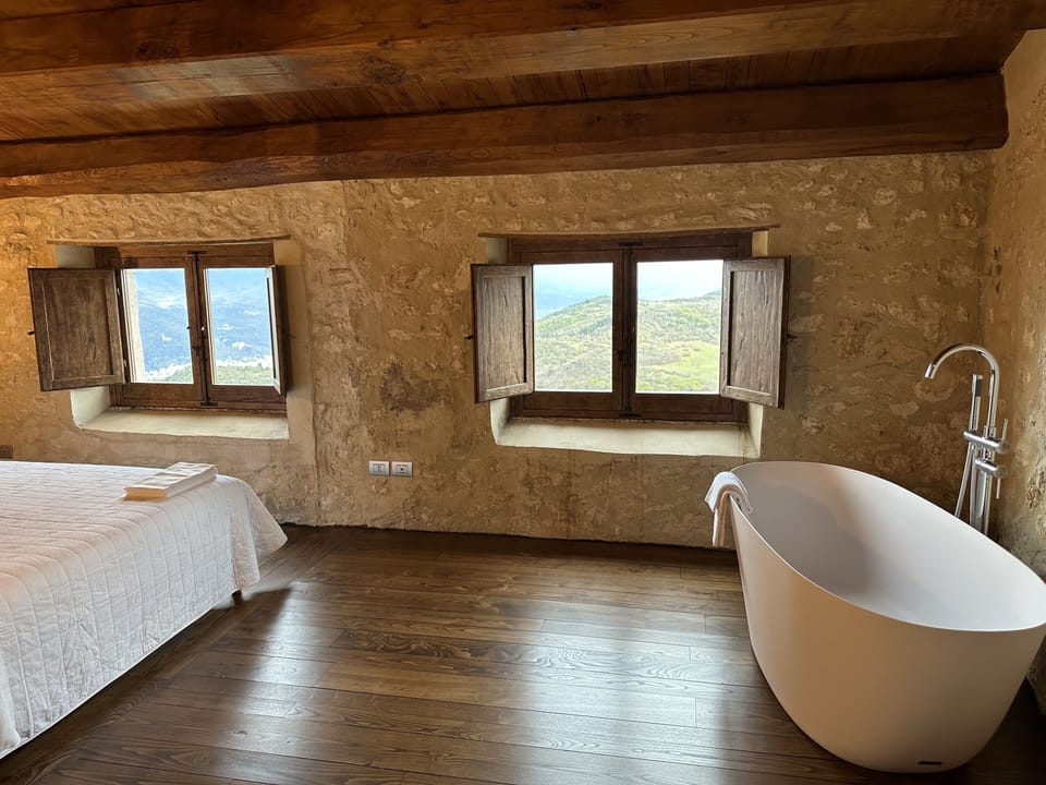 Deluxe Suite, 1 King Bed, Bathtub, Mountain View | Premium bedding, minibar, soundproofing, free WiFi