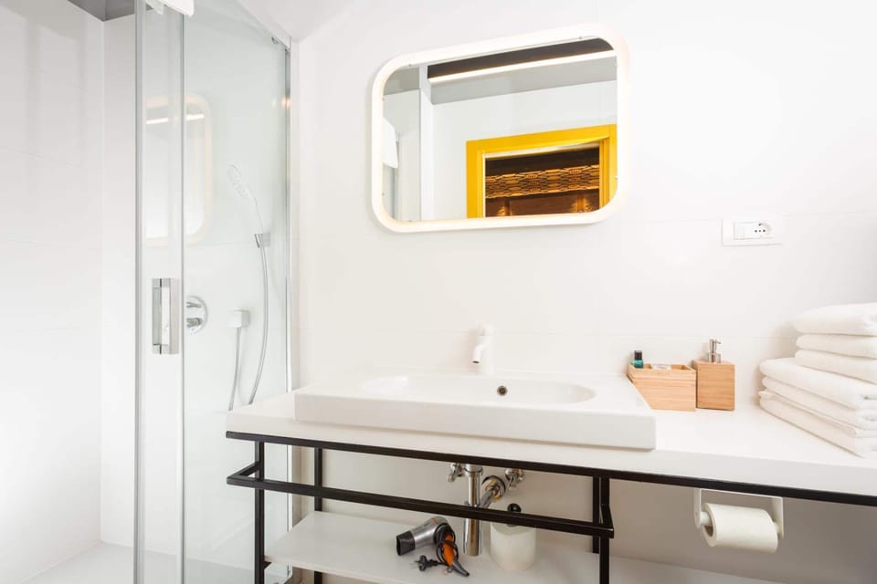 Shower, free toiletries, hair dryer, bathrobes