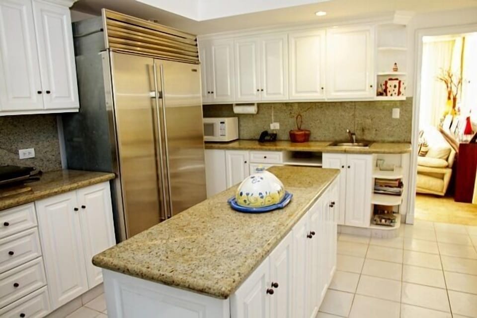 Villa | Private kitchen | Full-size fridge, microwave, oven, stovetop