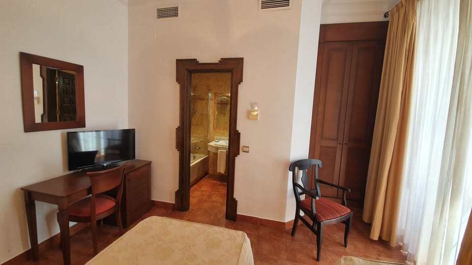 Double or Twin Room, City View | In-room safe, desk, blackout drapes, free cribs/infant beds