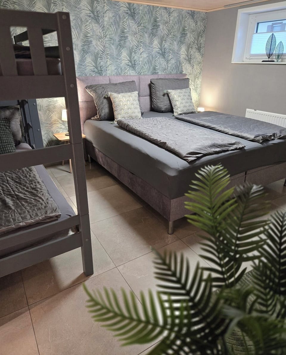 Family Room (2) | Down comforters, blackout drapes, free WiFi, bed sheets