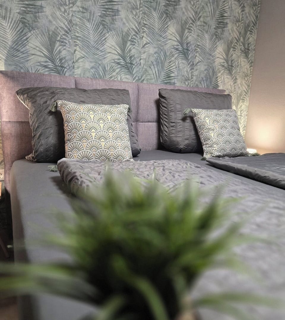 Family Room (2) | Down comforters, blackout drapes, free WiFi, bed sheets