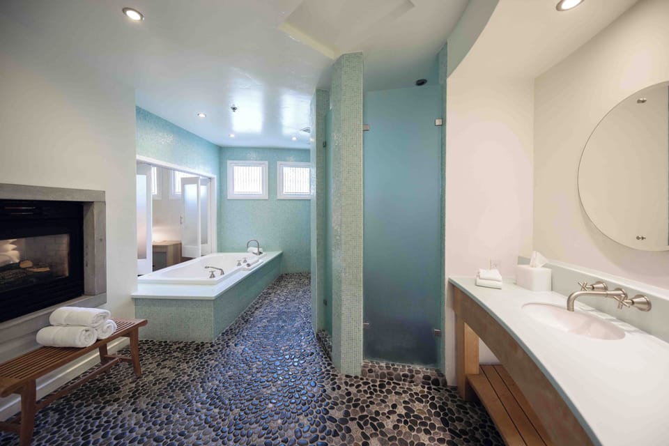 Suite, 1 King Bed (Junior Suite) | Bathroom | Designer toiletries, hair dryer, bathrobes, slippers
