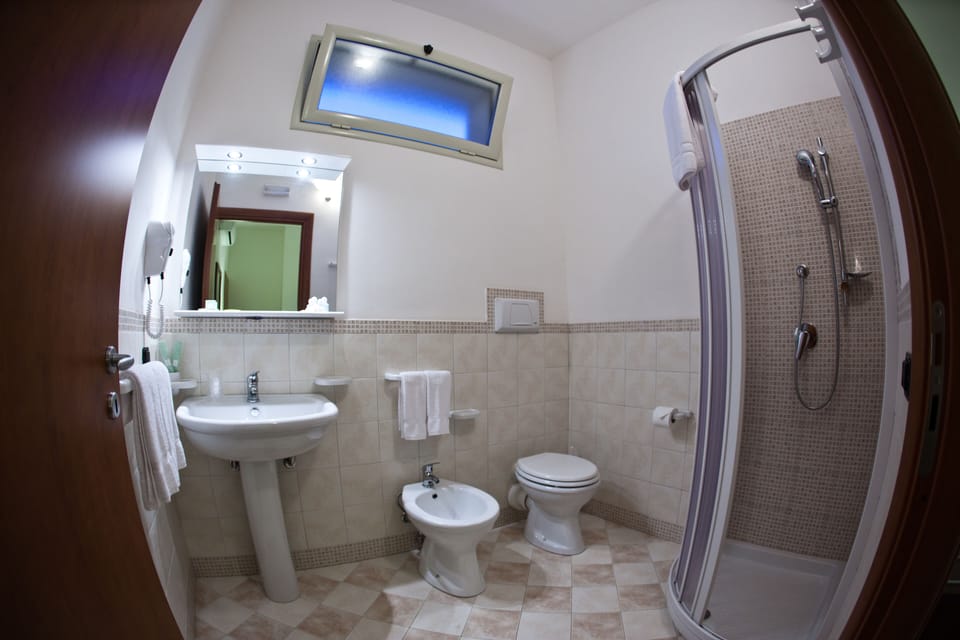 Deluxe Double or Twin Room, Balcony, Park View | Bathroom | Shower, free toiletries, hair dryer, bidet