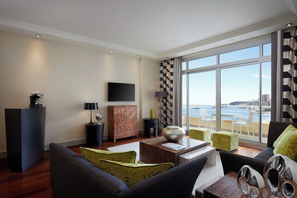 Executive Suite, 1 Bedroom, Terrace, Partial Sea View | Living room | 55-inch LED TV with digital channels, TV