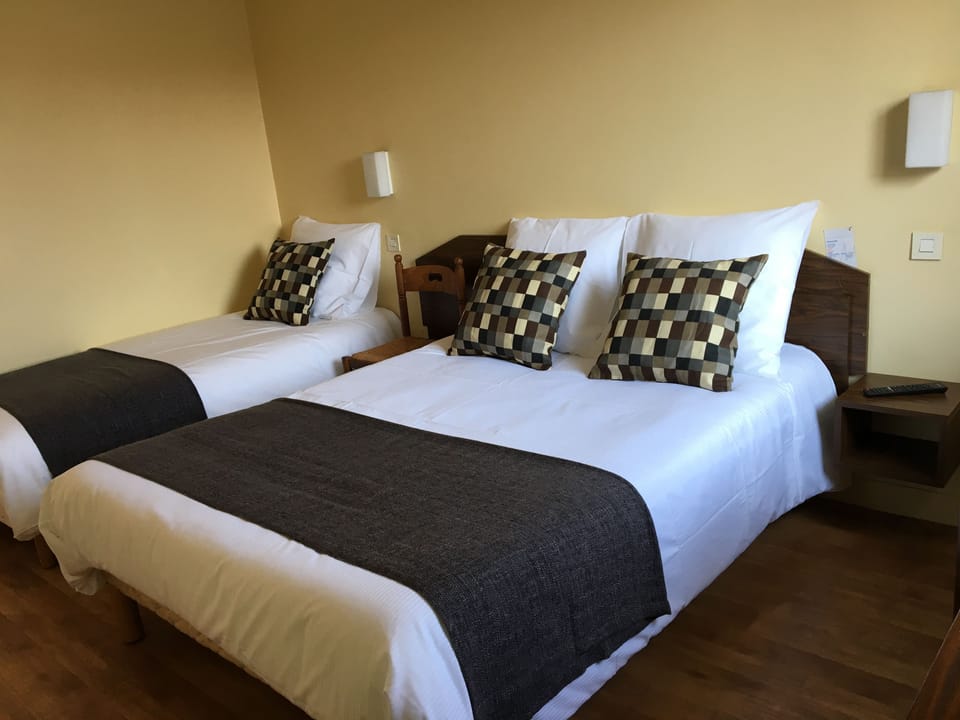 Triple Room | Desk, iron/ironing board, free WiFi, bed sheets