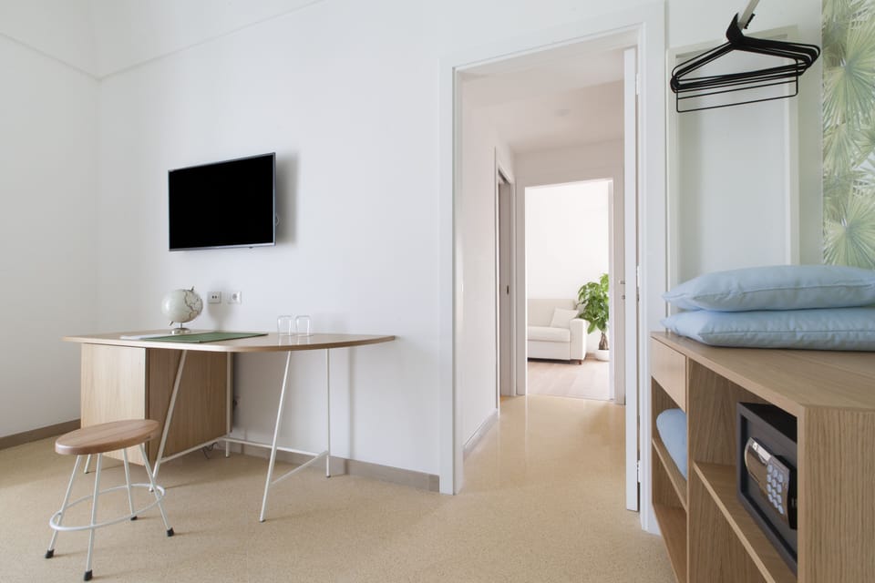Junior Suite, Terrace | Minibar, in-room safe, individually furnished, desk