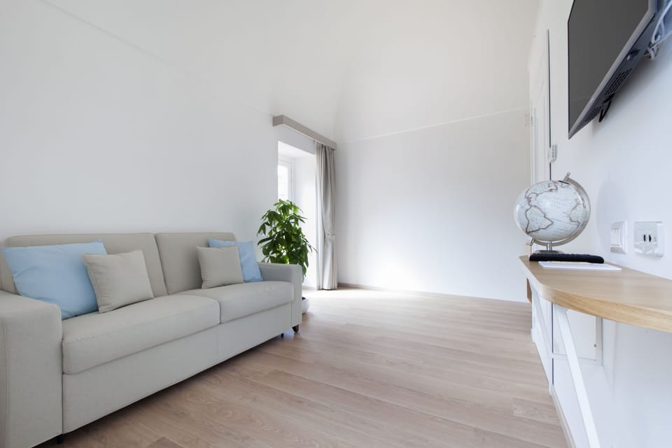 Junior Suite, Terrace | Living area | 40-inch flat-screen TV with cable channels