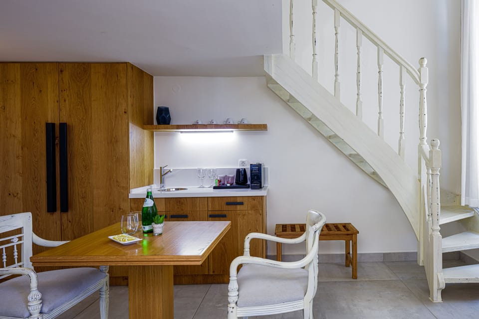 Suite, Partial Sea View (Split Level) | In-room dining