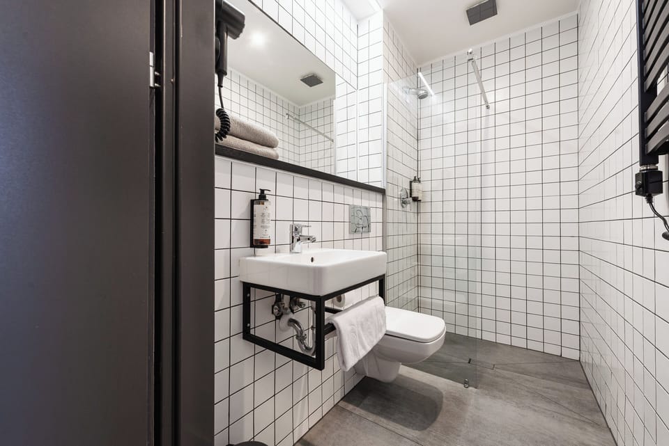 Shower, rainfall showerhead, eco-friendly toiletries, hair dryer