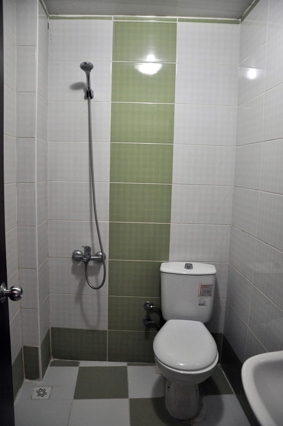 Shower, free toiletries, hair dryer, slippers