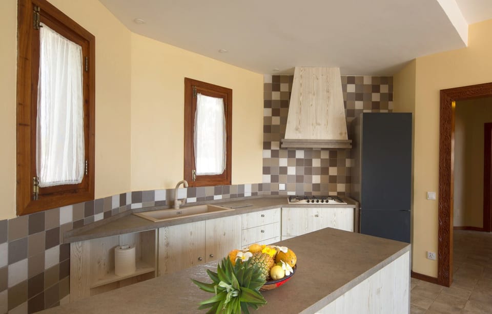 Luxury Villa, 4 Bedrooms, Ocean View, Beachfront | Private kitchen | Coffee/tea maker, fridge, microwave (on request), electric kettle