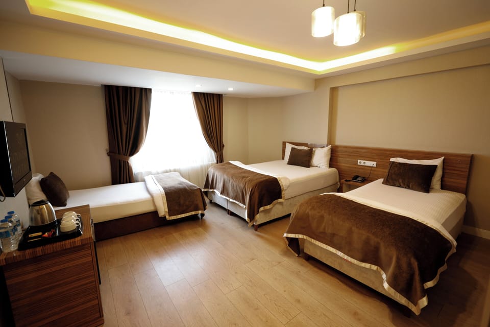 Standard Triple Room | Premium bedding, in-room safe, desk, free cribs/infant beds