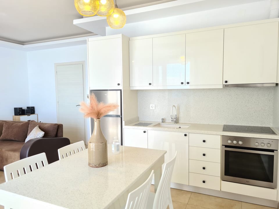Luxury Apartment, 1 Bedroom, Terrace, Sea Facing (Dahlia) | Private kitchen | Full-size fridge, oven, stovetop, espresso maker