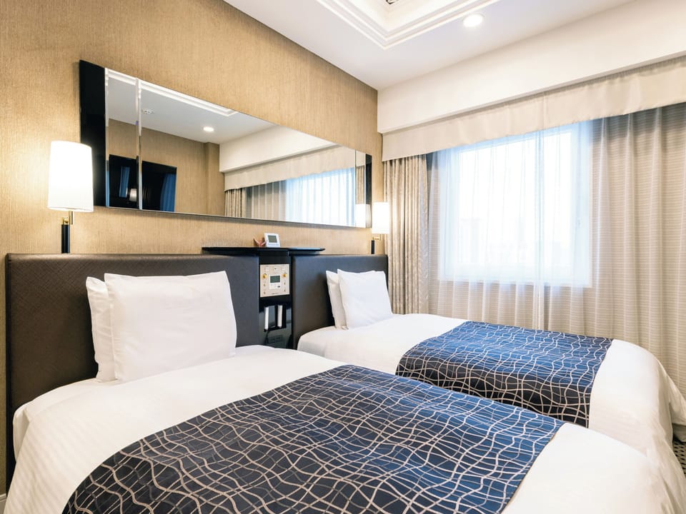 Down comforters, desk, blackout drapes, free WiFi