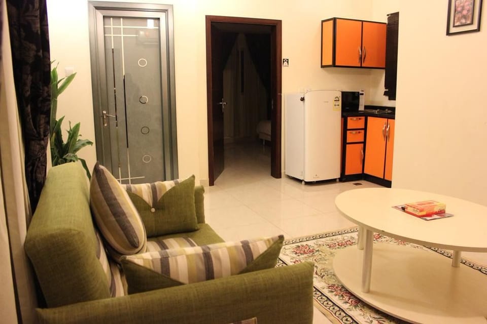 Apartment, 1 Bedroom | Living area | Flat-screen TV