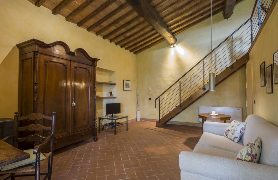 Deluxe Suite, Hill View | Living area | Flat-screen TV, pay movies