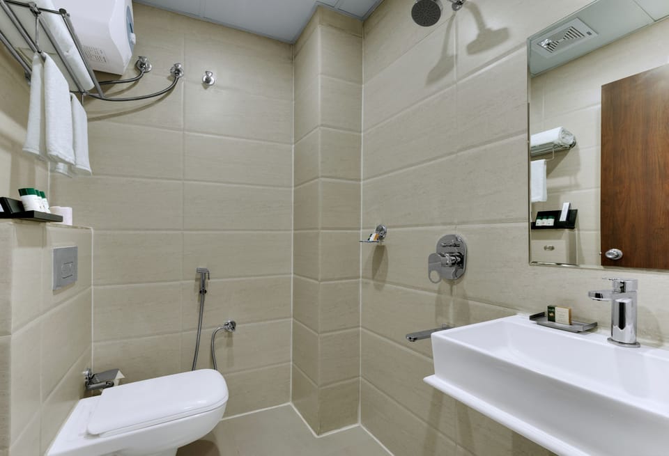 Shower, free toiletries, hair dryer, slippers