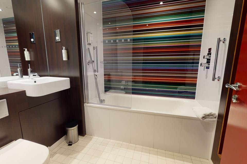 Rainfall showerhead, eco-friendly toiletries, hair dryer, towels