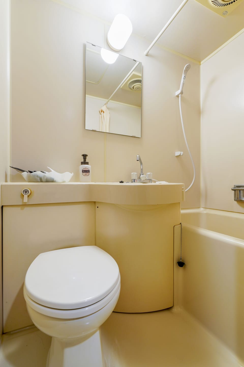 Combined shower/tub, hair dryer, bathrobes, slippers