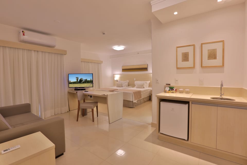 Superior Room | Minibar, in-room safe, desk, laptop workspace