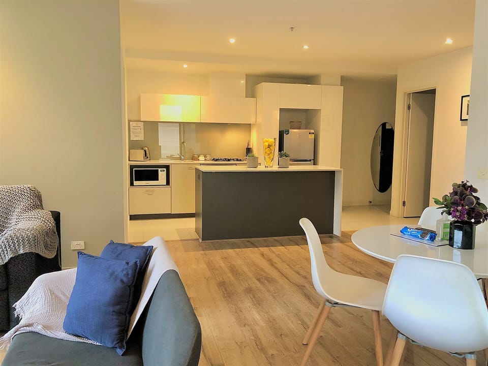 Deluxe Apartment, 2 Bedrooms | Living area | Flat-screen TV