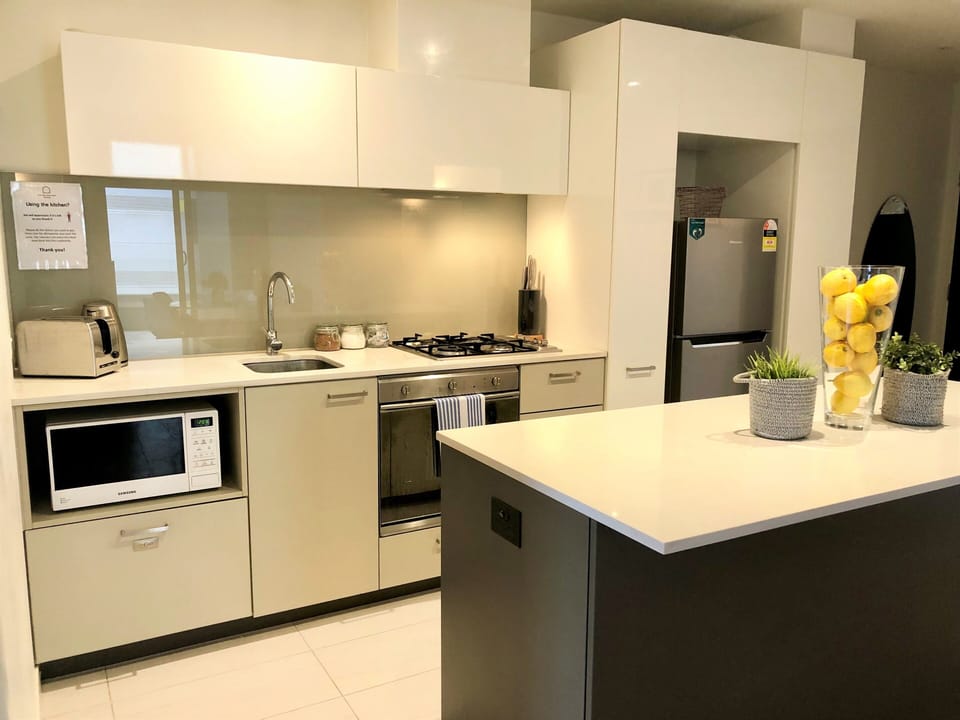 Deluxe Apartment, 2 Bedrooms | Living area | Flat-screen TV