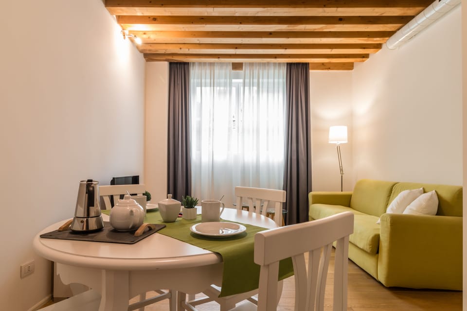 Apartment, 1 Bedroom | Living area | Flat-screen TV
