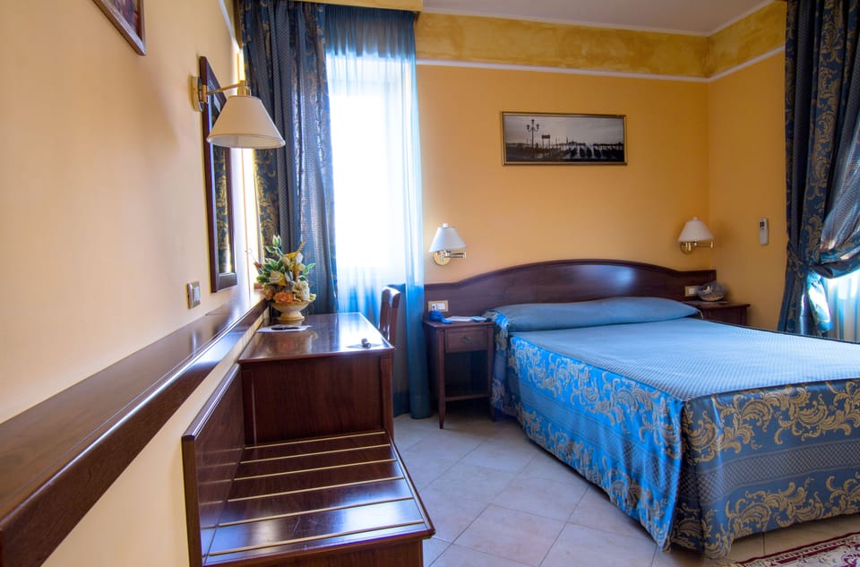 Double or Twin Room | 1 bedroom, minibar, in-room safe, desk