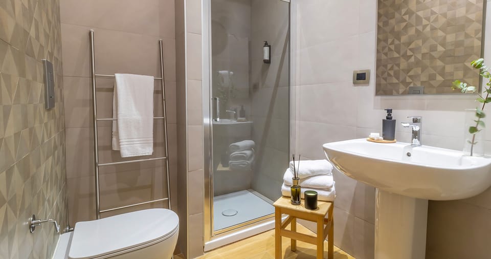 Family Suite, Non Smoking, Garden View (Mini) | Bathroom | Shower, rainfall showerhead, free toiletries, hair dryer