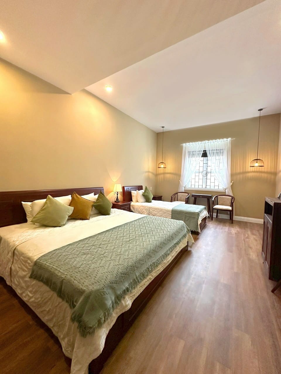 Family Triple Room | Minibar, individually furnished, desk, laptop workspace