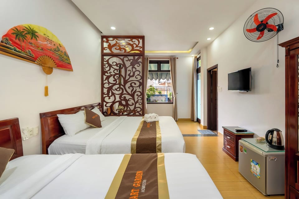 Family Triple Room, Terrace | Minibar, desk, blackout drapes, soundproofing