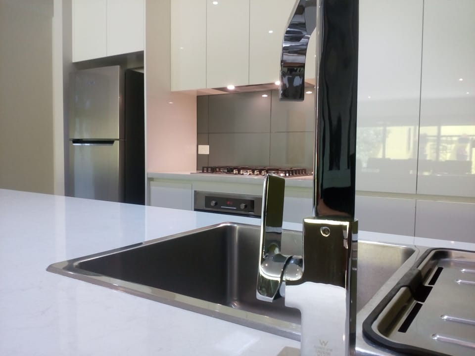 Luxury Apartment, 2 Bedrooms | Private kitchen | Full-size fridge, microwave, oven, stovetop