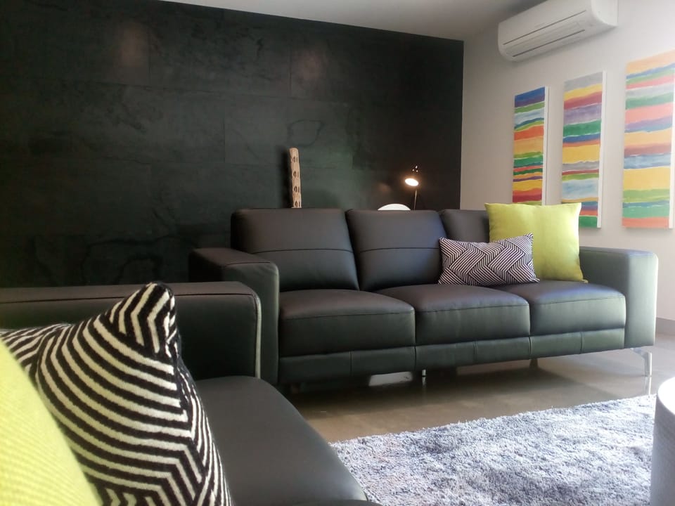 Luxury Apartment, 2 Bedrooms | Living room | LED TV, fireplace, DVD player