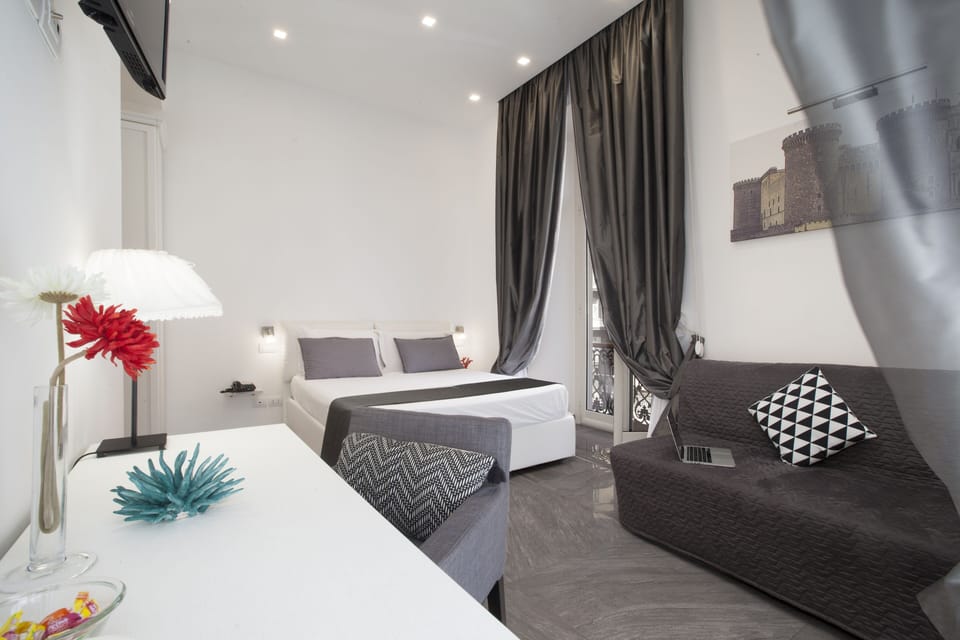 Deluxe Double Room, 1 Bedroom, City View | Minibar, in-room safe, desk, soundproofing