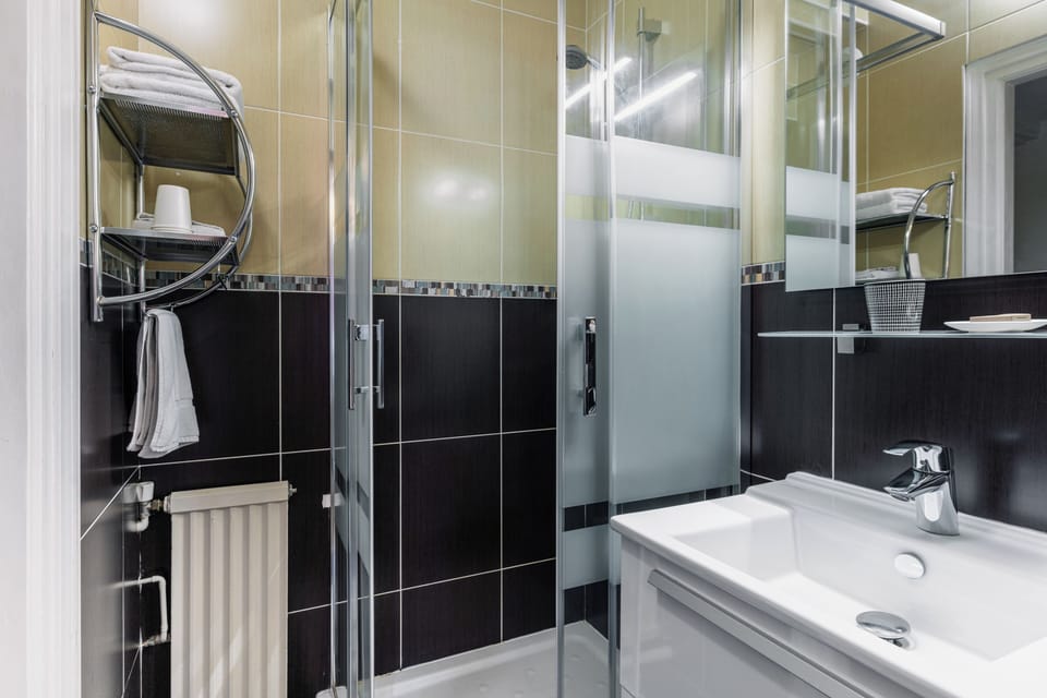 Shower, free toiletries, hair dryer, towels