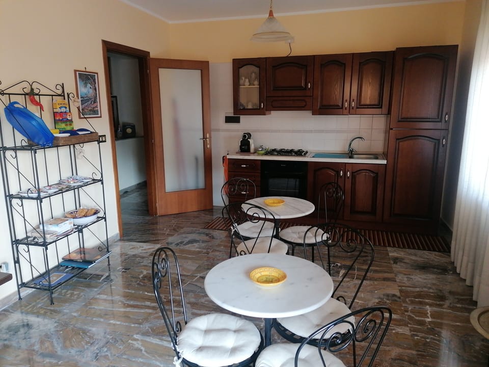 Deluxe Room | Shared kitchen | Full-size fridge, microwave, oven, stovetop