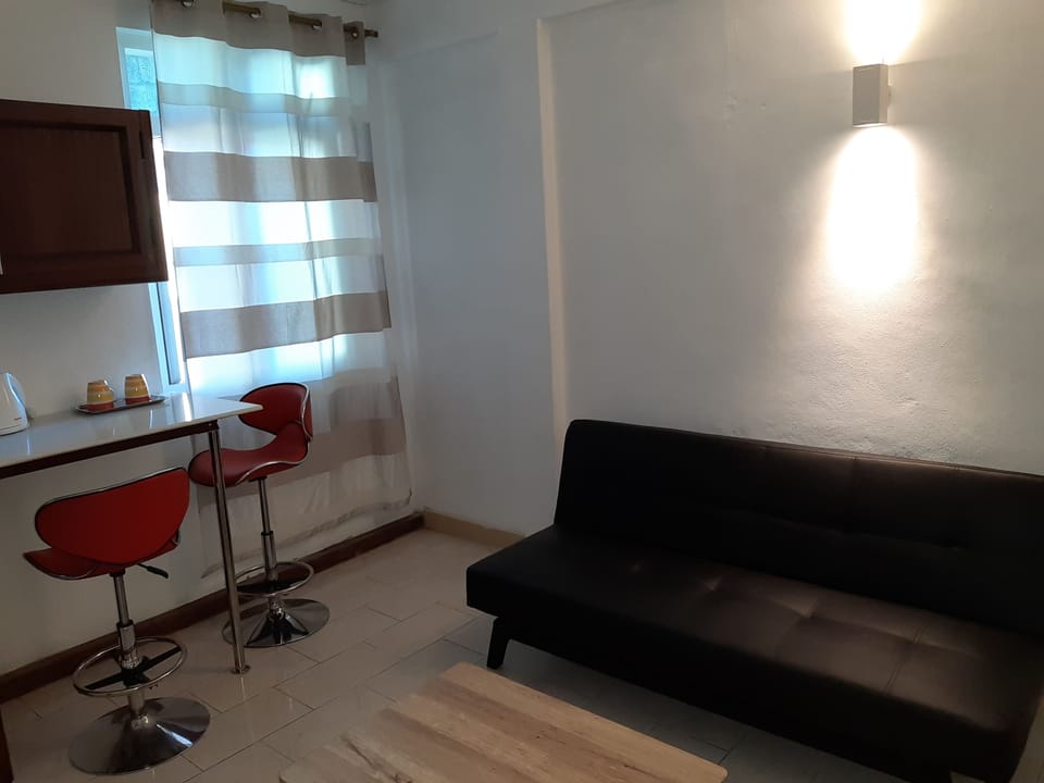 Deluxe Suite, 1 Bedroom | Living area | 40-inch LED TV with satellite channels, TV