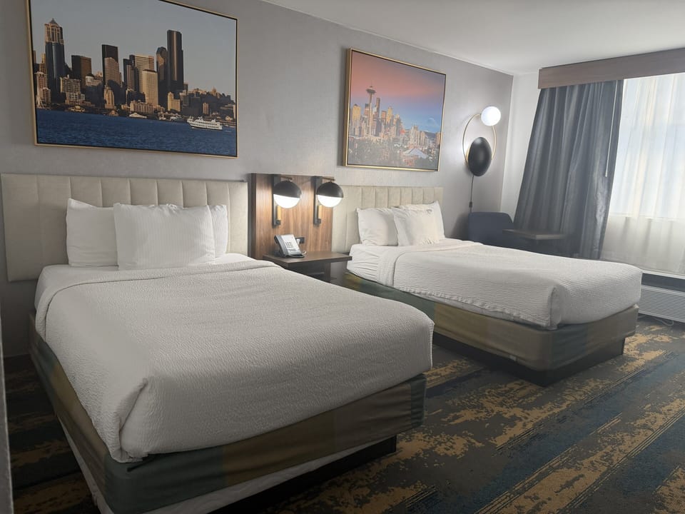 Premium bedding, pillowtop beds, desk, blackout drapes