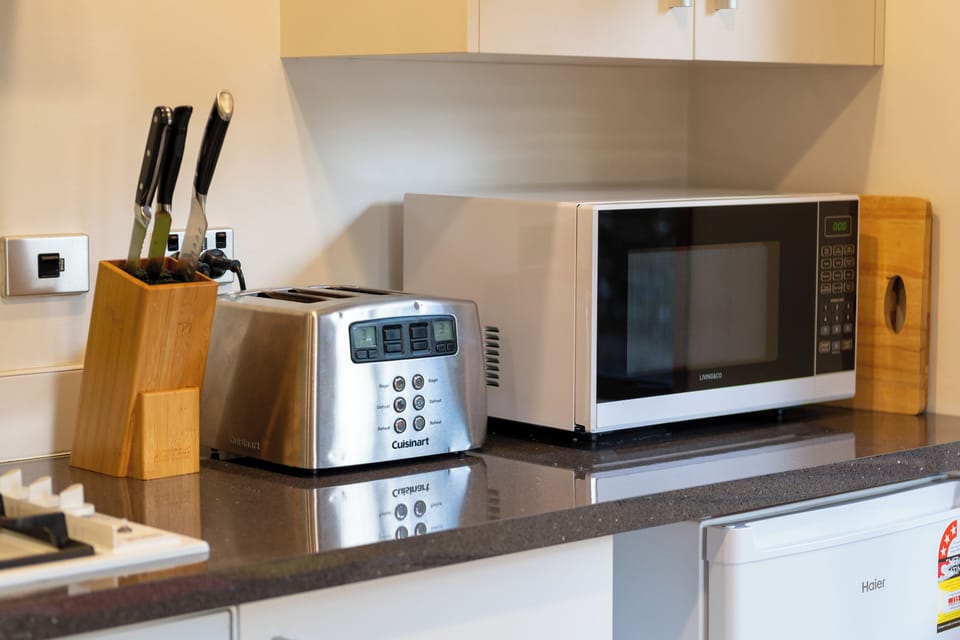 Apartment | Private kitchen | Shared fridge, microwave, coffee/tea maker, electric kettle