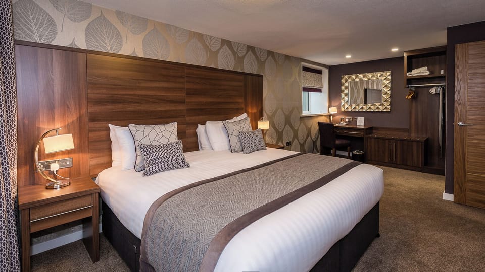 Luxury Suite | Premium bedding, blackout drapes, iron/ironing board, free WiFi